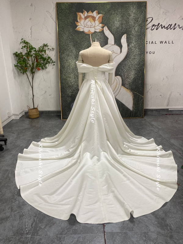 Off the shoulder wedding dress with long train
