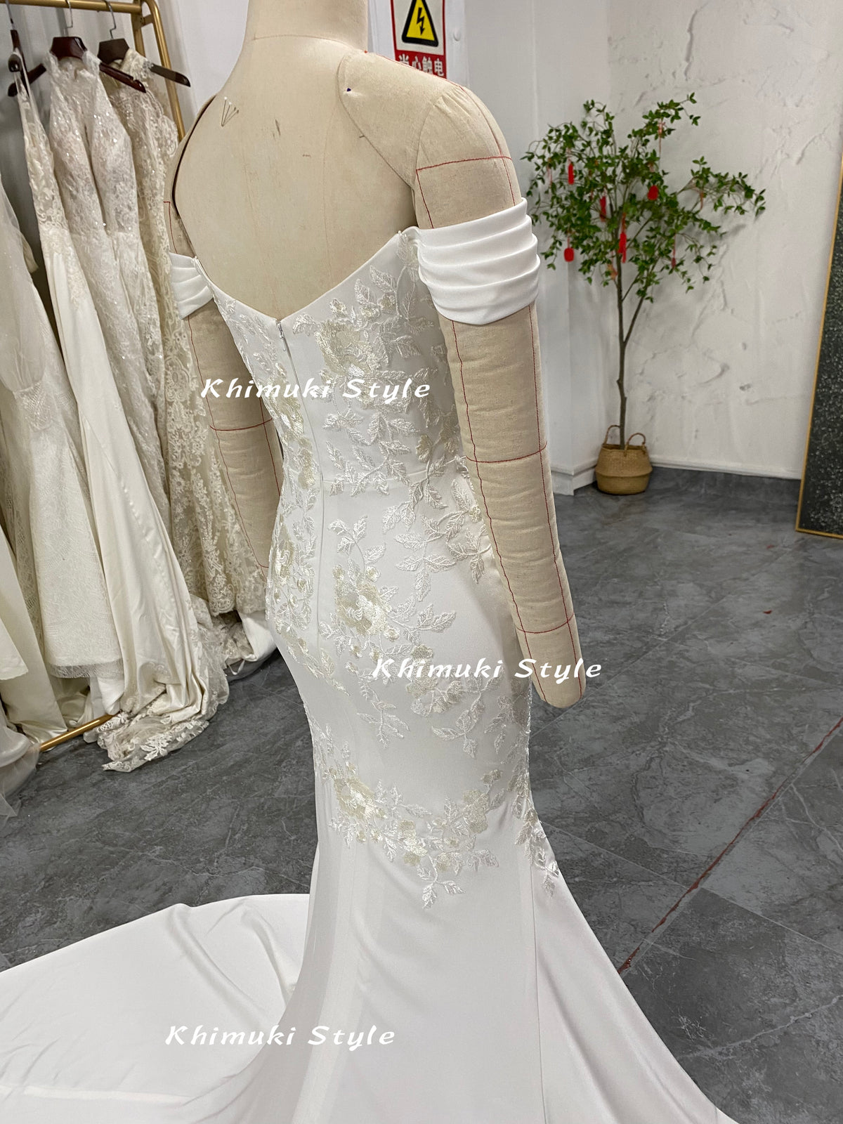 fitted ivory satin wedding dress