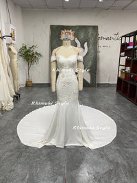 sheath off the shoulder wedding gown